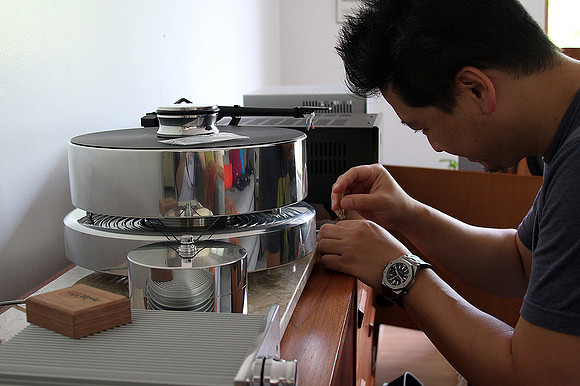 Edward Ku Setting Up Fat Bob Turntable At Rafe's Apartment